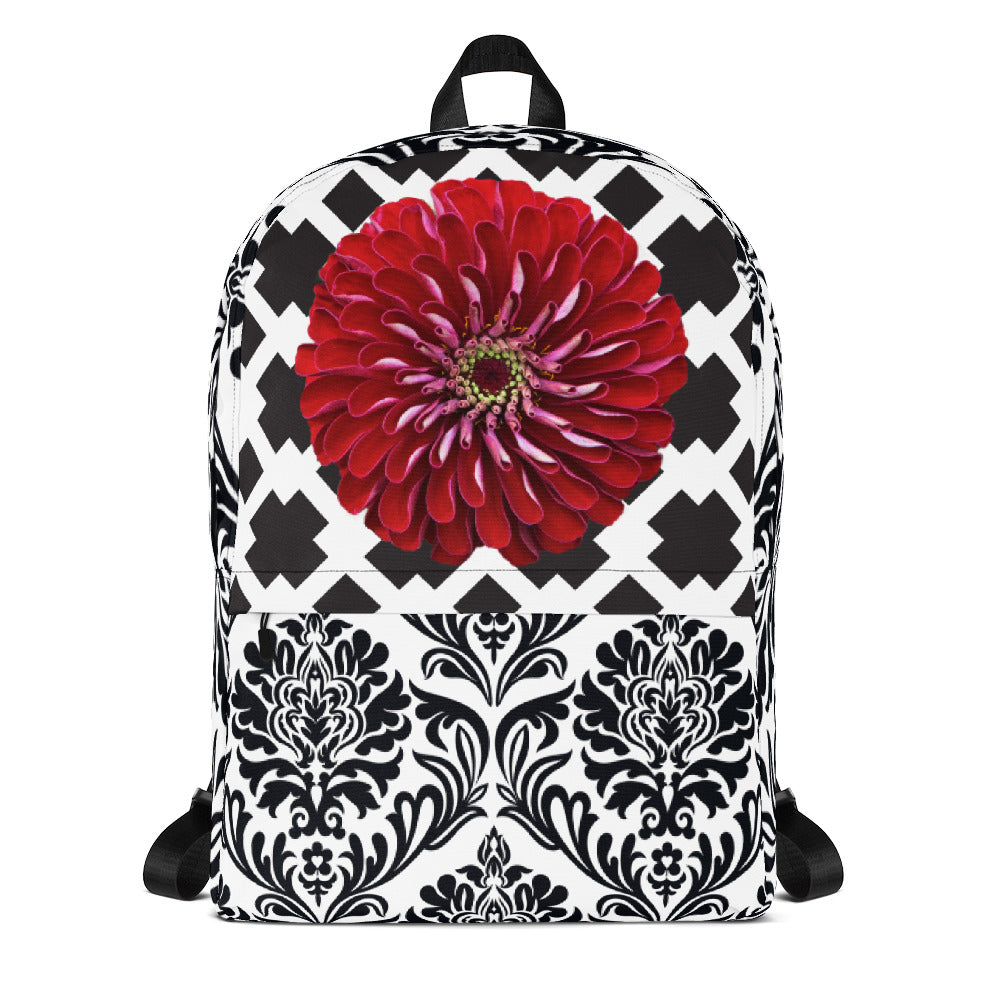 Backpack with fun black and white patterns and a beautiful red flower